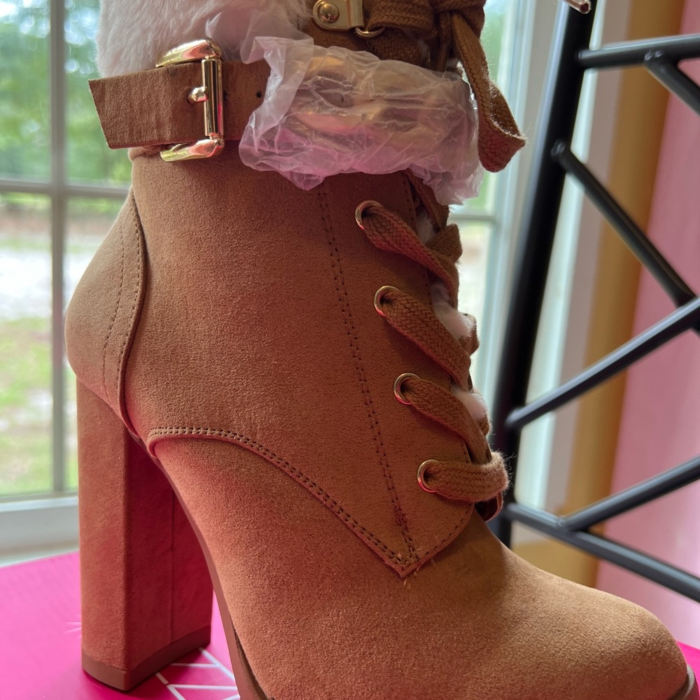 Beautiful high boots with buckle and lace, they are so cute.
